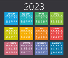 Colorful year 2023 calendar isolated on black background. Vector Template.