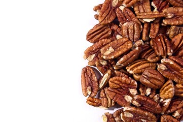 Shelled pecans to the right of white