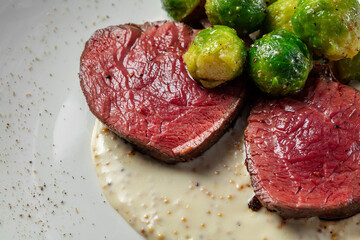 Filet mignon steak with Brussels sprouts