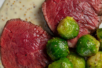 Filet mignon steak with Brussels sprouts