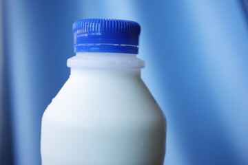 full cream milk in a plastic container 