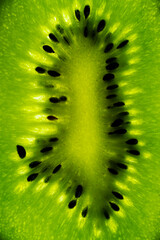 Close-up of kiwi pulp. Green fruit background.