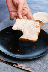 low fact cheese cream spread on a bread on table
