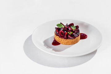 Cherry tart with a glass of wine