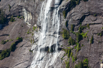 Waterfall in fjord, south east alaska