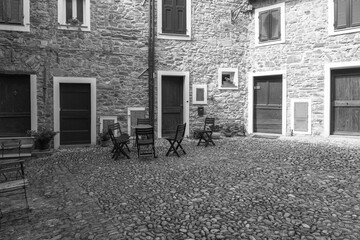 Fototapeta na wymiar Old small square of the city centre of Castel Vittorio; It's a small village of far west of Liguria Region (Northern Italy), near the French borders.