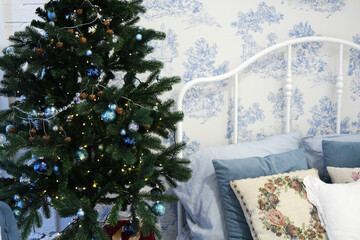 Christmas interior of a children's room in vintage style and blue colors.