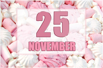 calendar date on the background of white and pink marshmallows. November 25 is the twenty-fifth  day of the month