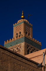 Minaret of Koutoubia mosque with Moroccan architecture