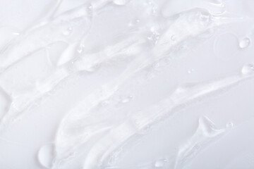 Obraz premium Hyaluronic acid or collagen gel close up. Textured background with oxygen bubbles in cosmetics. Moisturizing serum for the skin.