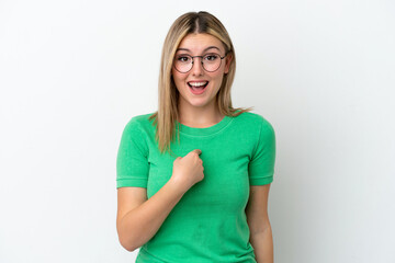 Young caucasian woman isolated on white background with surprise facial expression