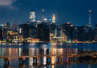 city skyline at night beautiful New York river reflections sunrise