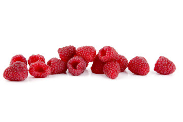 Pile of raspberries isolated on white background. Ripe fresh red berries.