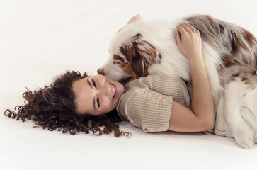 Naklejka premium young Woman and Australian Shepherd Dog