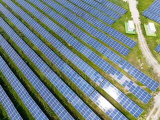 solar power station in farm during sunset