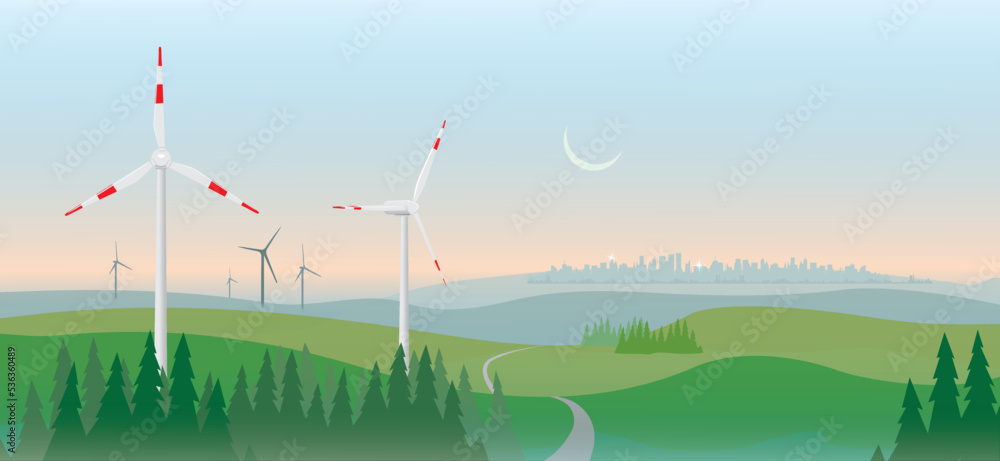 Wall mural green hilly landscape with wind turbines and city in the background. sustainable renewable green ene