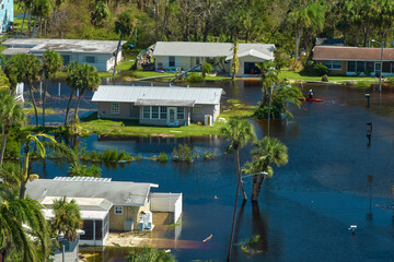 Flooded houses by hurricane Ian rainfall in Florida residential area. Consequences of natural...