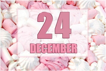 calendar date on the background of white and pink marshmallows. December 24 is the twenty-fourth  day of the month