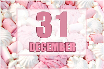 calendar date on the background of white and pink marshmallows. December 31 is the thirty-first day of the month