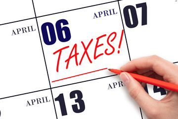 Hand drawing red line and writing the text Taxes on calendar date April 6. Remind date of tax payment