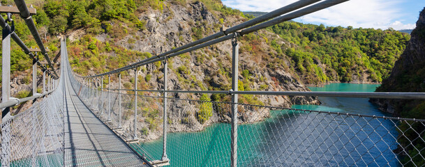 View on himalayan footbridge crossing the Drac near Lake Monteynard - obrazy, fototapety, plakaty