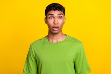 Portrait of impressed confused young person staring cant believe isolated on yellow color background