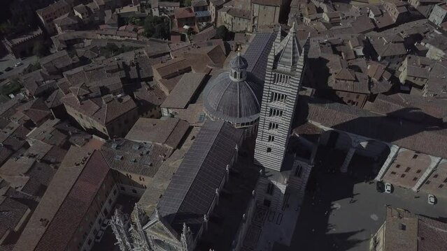 Siena Italy Cathedral Duomo in Tuscany, Drone Aerial footage during golden hour