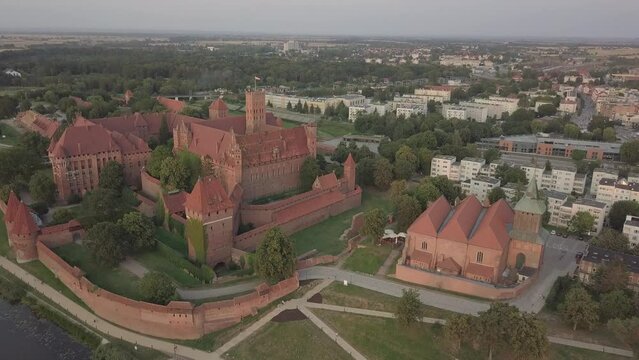 Malbork Castle and Nogat River in Poland Golden hour aerial drone footage