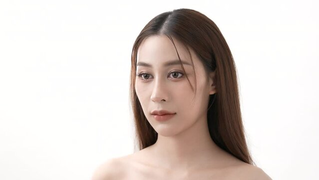 Beauty concept of 4k Resolution. Asian woman opening her eyes on a white background.