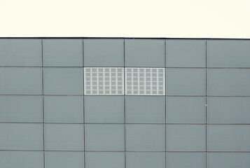 Urban abstract architecture. Close up of a contemporary building facade.