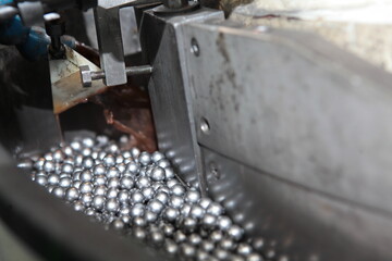 Bearings in production. Small diameter bearings. Heavy industry. The concept of the industrial...