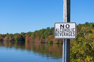 No alcoholic beverages sign on lake