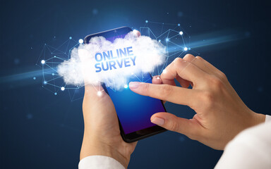 Hand using smartphone with cloud business concept