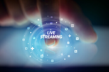 Finger touching tablet with social media icons concept