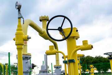 gas pipeline, natural gas installation, yellow pipes and valves, high gas prices