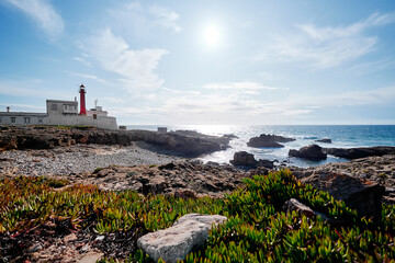 Fototapeta na wymiar Farol do Cabo Raso. Beautiful landscape. Atlantic ocean rock shore, Portugal.