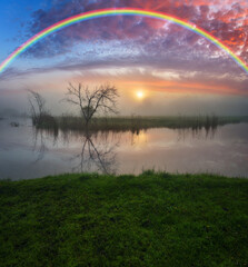 Naklejka premium Landscape with a Rainbow on the River in Spring. colorful morning. nature of Ukraine