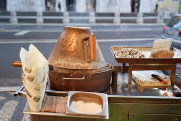 Roasted chestnuts sold at streets of Lisbon, Portugal.