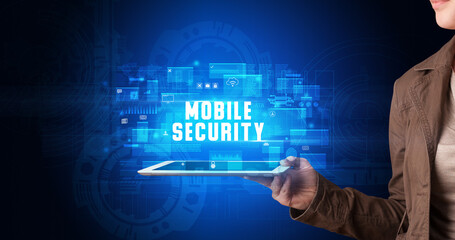 Person holding tablet, security concept