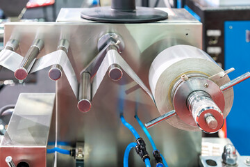 roll aluminum foil of blister packing at automatic manufacturing machine for pharmaceutical in...