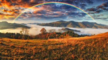 Obraz premium Rainbow over the Mountains. autumn morning in the Carpathians. Nature of Ukraine