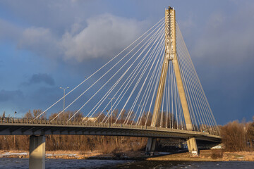 Fototapeta premium Swietokrzyski Bridge over Vistula River in Warsaw city, Poland