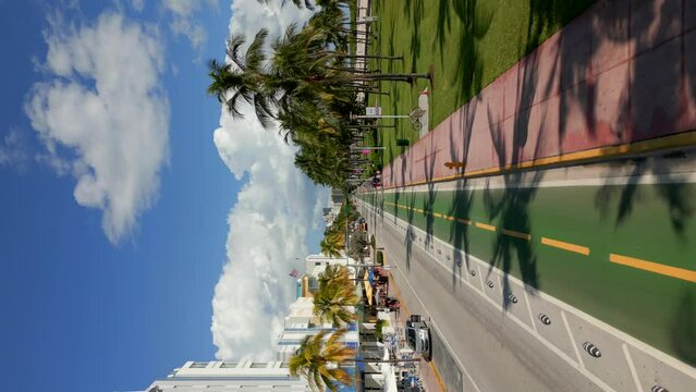 Vertical aerial video Miami Beach SOBE Ocean drive green painted bike lanes