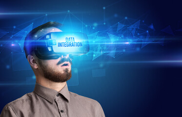 Businessman looking through Virtual Reality glasses, virtual security concept