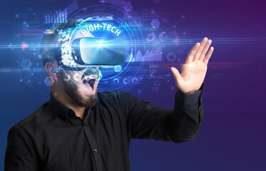 Businessman looking through VR glasses