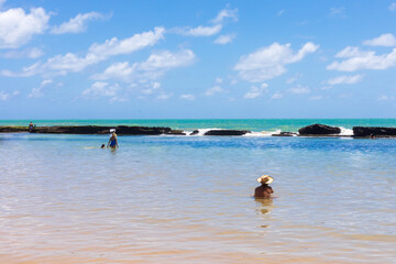 Natural pools produced by the beach reefs