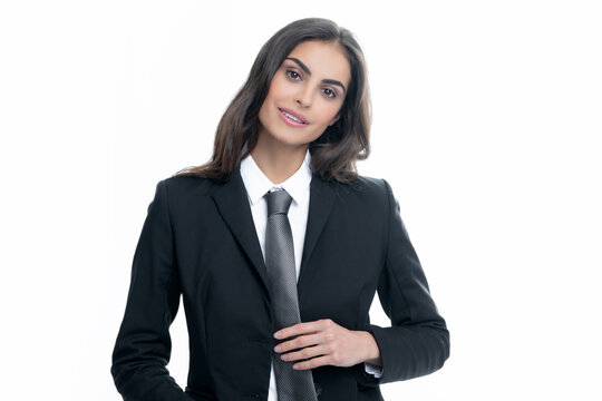 Business woman in suit and tie. Confident female entrepreneur. Businesswoman correct necktie, prepare for business meeting. Portrait of attractive elegant fixing suit isolated on white background.