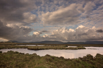 Fens and bogland at Aughness, Ballycroy, Ireland. On the horizon the mountains of Wild Nephin National Park.