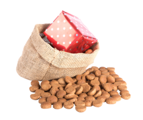 Jute bag with ginger nuts and presents, a Dutch tradition at Sinterklaas event in december isolated on transparent background