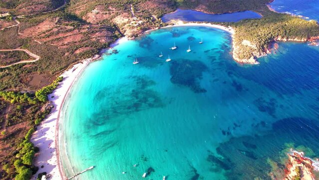 Cinematic Aerial of Rondinara Beach: Perfect Shell-Shaped Bay and Turquoise Lagoon. High-Quality 4K Drone Footage of Corsica&rsquo;s Most Beautiful Coastline, France